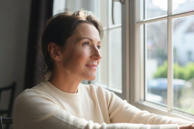 generalized anxiety disorder calm adult reflecting by window